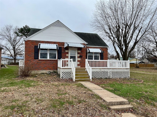 bungalow with a front yard