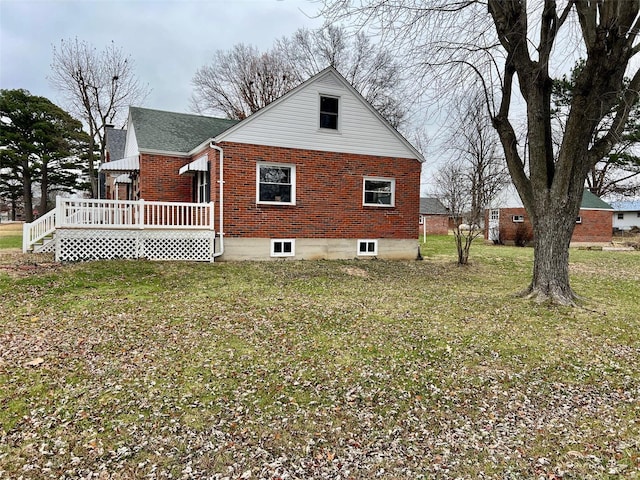 view of property exterior featuring a lawn