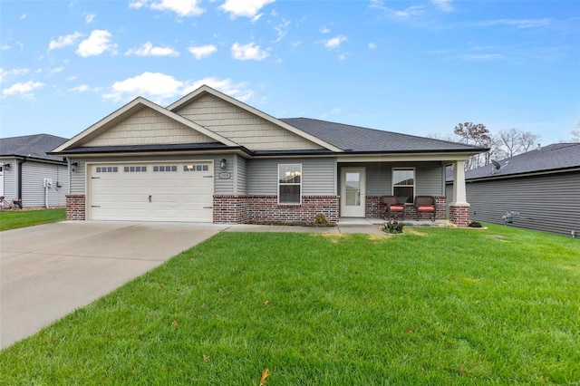 craftsman-style home featuring covered porch, a garage, and a front lawn