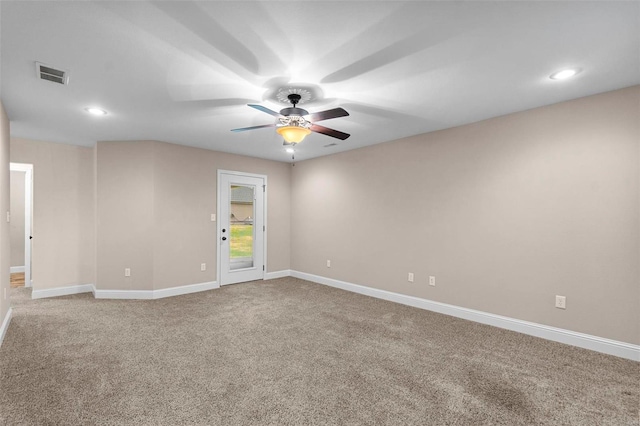 spare room with carpet flooring and ceiling fan