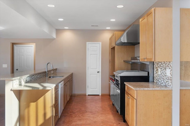 kitchen with wall chimney range hood, sink, backsplash, stainless steel range, and light brown cabinetry