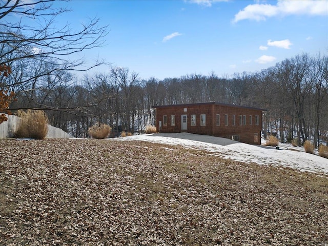 view of snow covered property