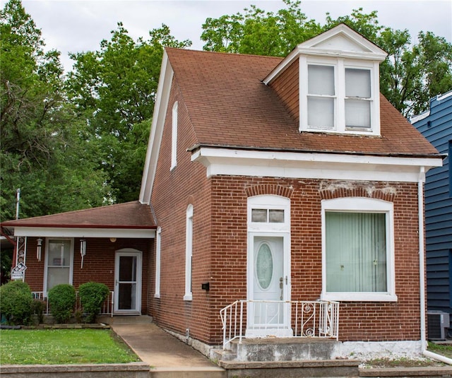 view of front of house featuring cooling unit