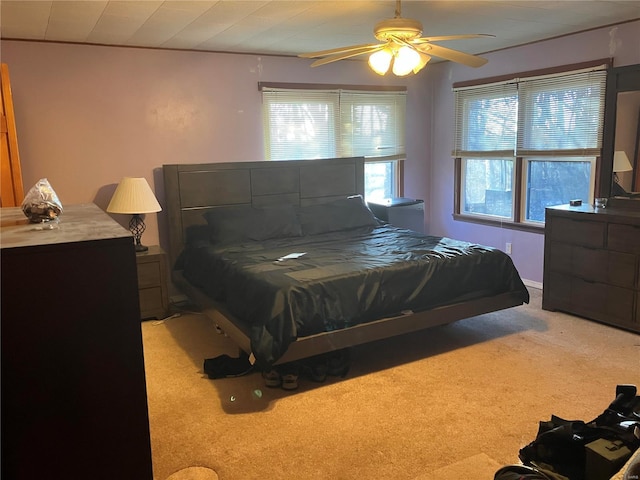 carpeted bedroom featuring ceiling fan and wooden ceiling