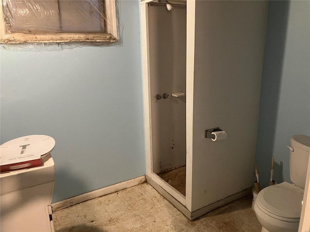 bathroom featuring toilet