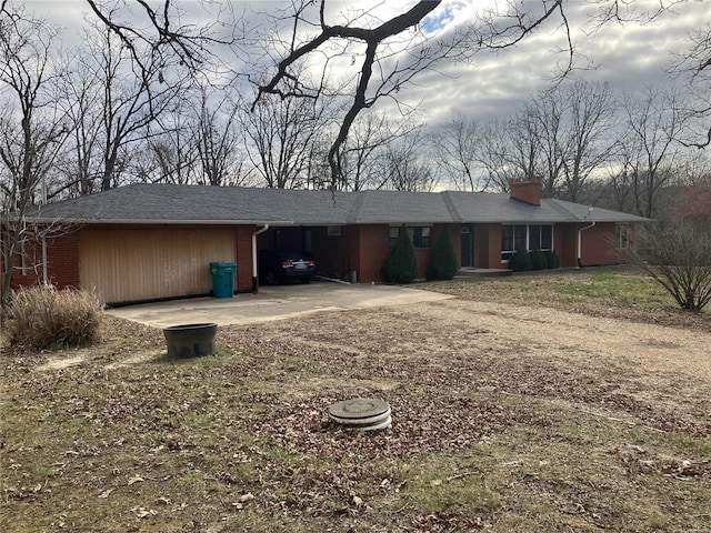 view of front of house with a carport