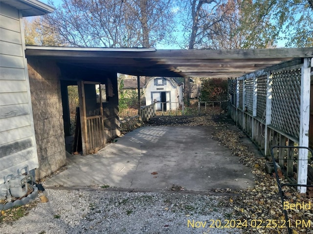 view of parking featuring a carport