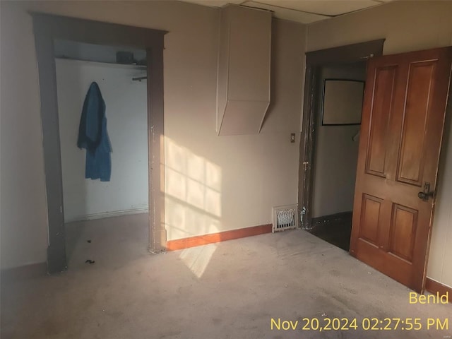 unfurnished bedroom featuring concrete flooring