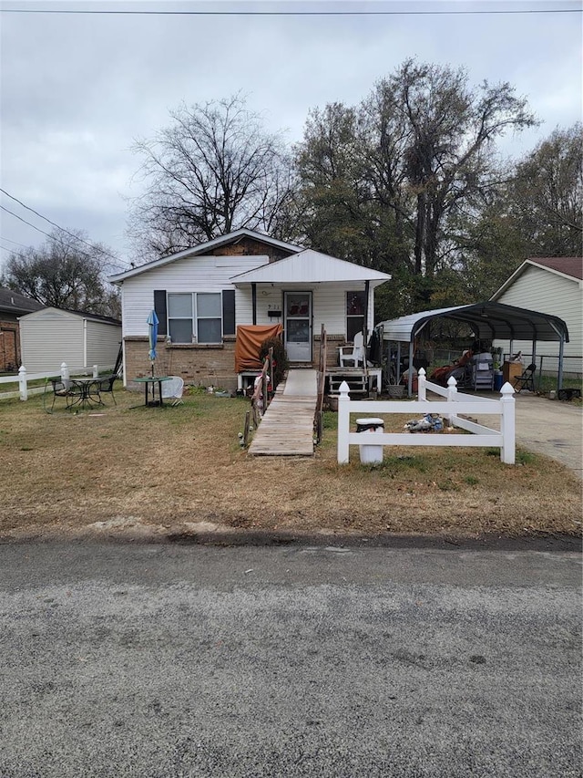 view of front facade with a carport