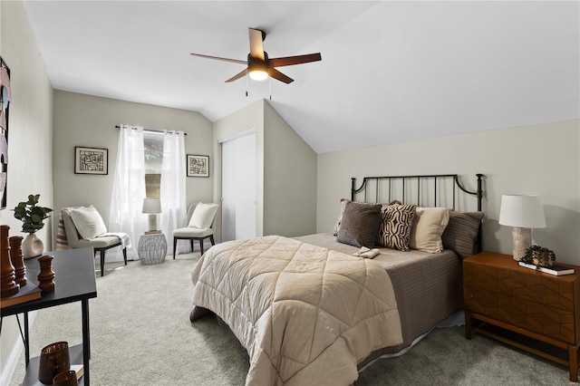 bedroom with lofted ceiling, carpet flooring, and ceiling fan
