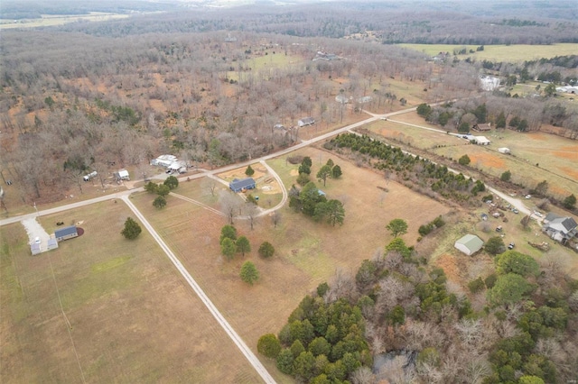 birds eye view of property featuring a rural view