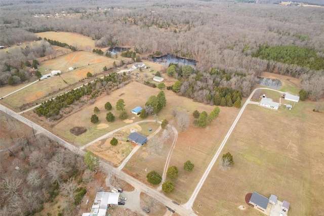 birds eye view of property featuring a rural view