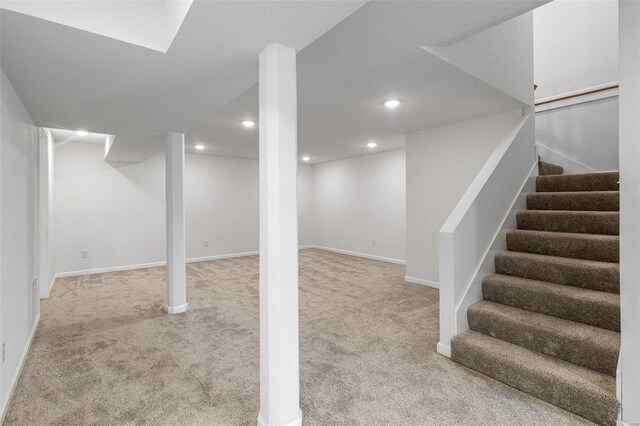 basement with light carpet