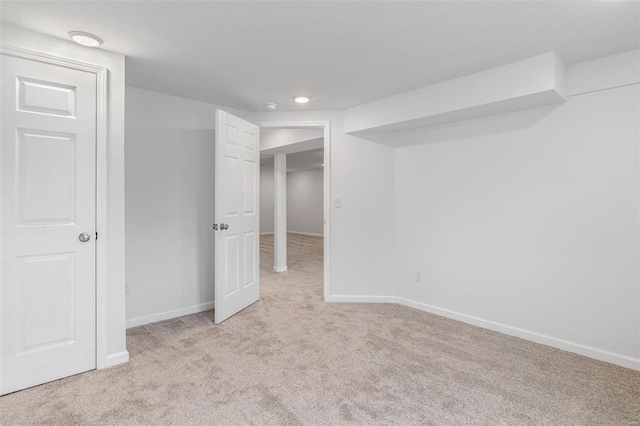 unfurnished bedroom featuring light colored carpet