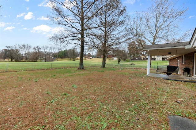 view of yard featuring a patio area and a rural view