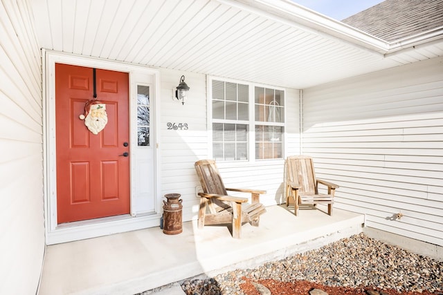 entrance to property featuring covered porch