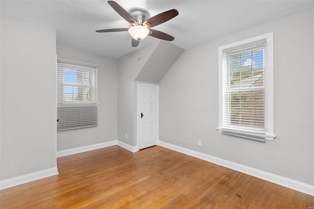 bonus room featuring ceiling fan and light hardwood / wood-style flooring