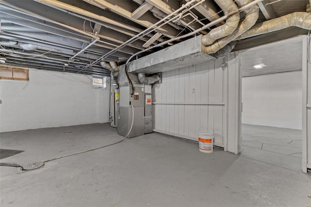 basement featuring heating unit