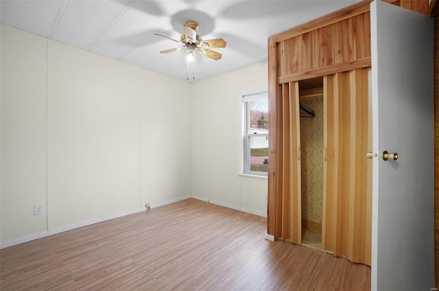 unfurnished bedroom with light hardwood / wood-style flooring and ceiling fan