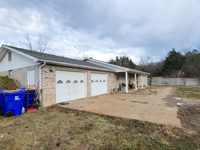 view of side of property with a garage