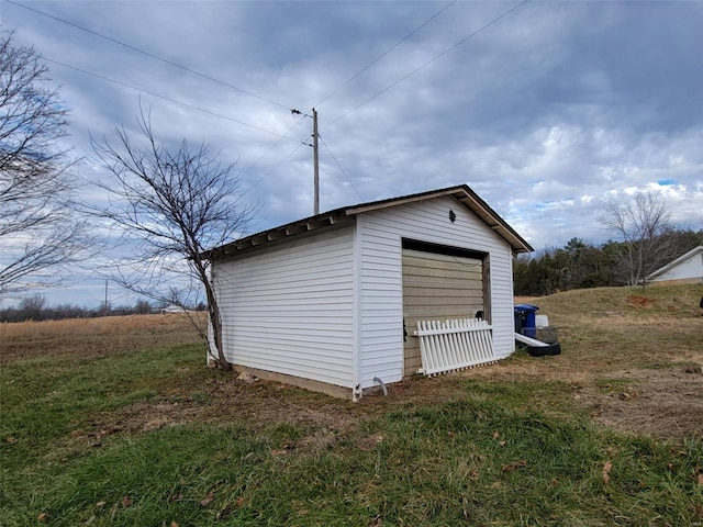 view of outdoor structure with a garage