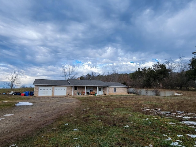 view of front of property with a garage