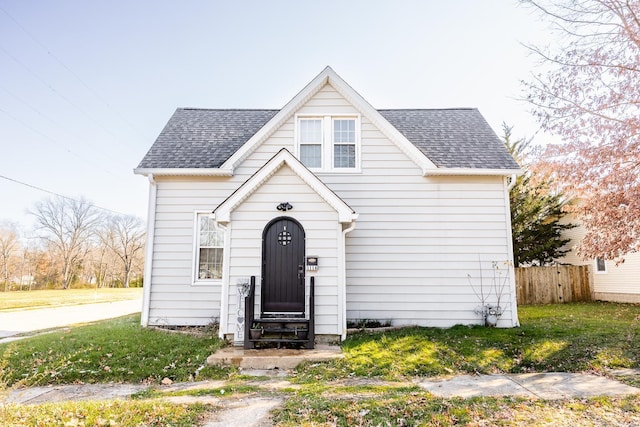 view of front of home with a front yard