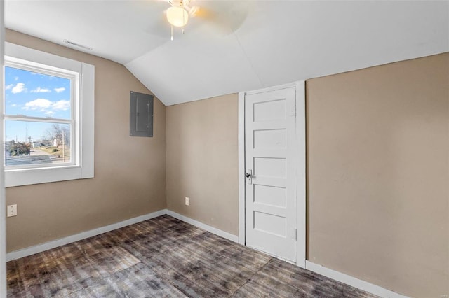 bonus room featuring electric panel, vaulted ceiling, and ceiling fan