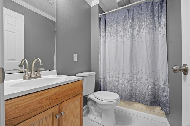 bathroom featuring tile patterned flooring, vanity, toilet, and crown molding