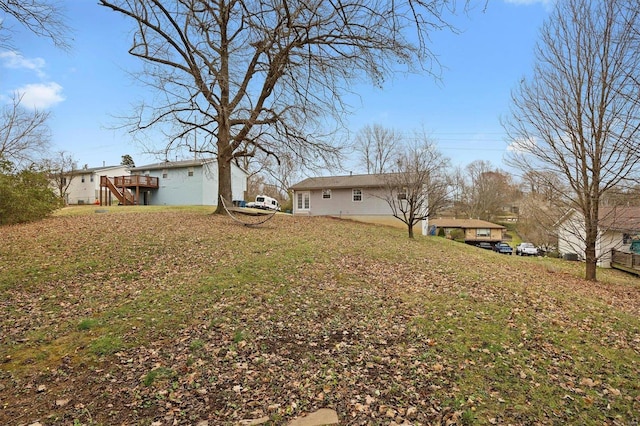 view of yard featuring a deck