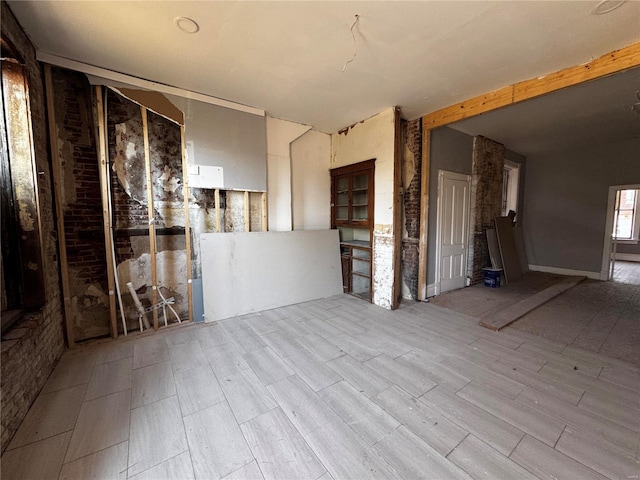 spare room featuring light hardwood / wood-style floors