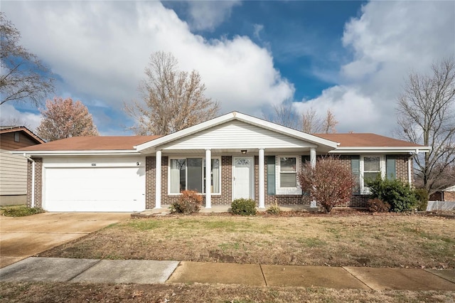 single story home with a garage and a front yard