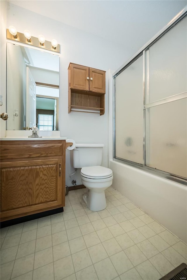 full bathroom with toilet, vanity, and combined bath / shower with glass door