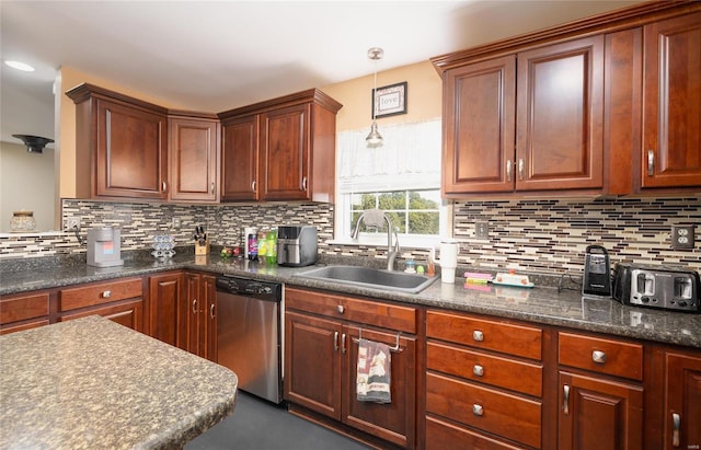 kitchen with dishwasher, decorative backsplash, sink, and decorative light fixtures