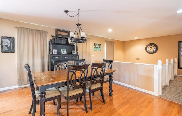 dining room with light hardwood / wood-style flooring