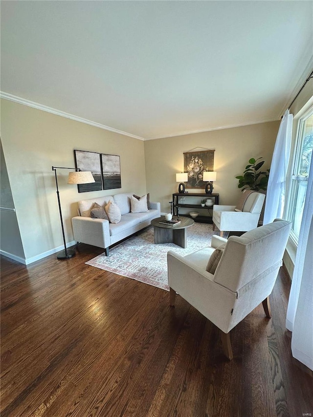 living room featuring dark hardwood / wood-style floors and ornamental molding