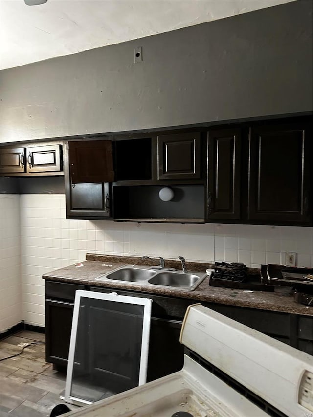 kitchen with white range and sink