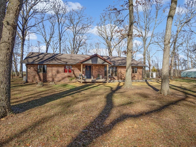 ranch-style house with a front yard