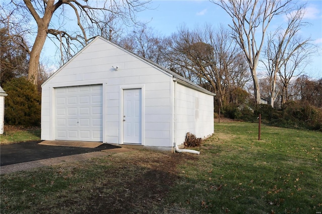 garage with a lawn