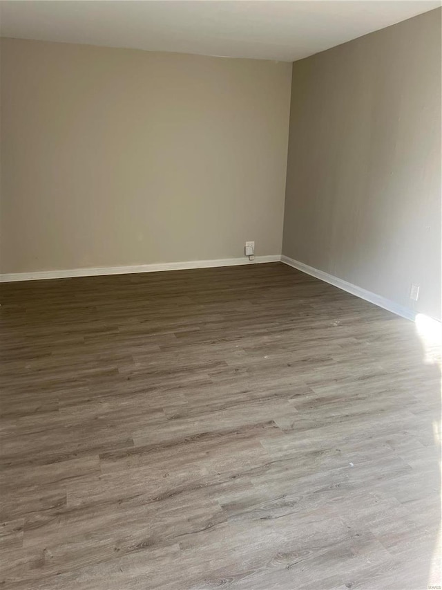 unfurnished room featuring light wood-type flooring