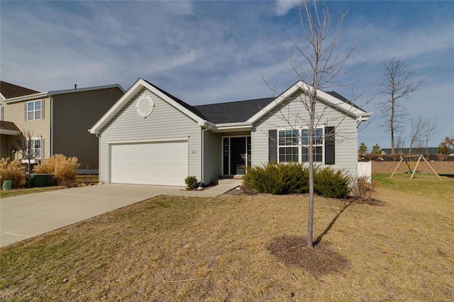 ranch-style home with a garage and a front yard