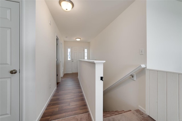 hall with dark hardwood / wood-style floors