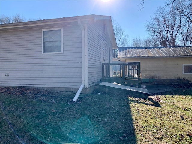 view of side of property with a deck