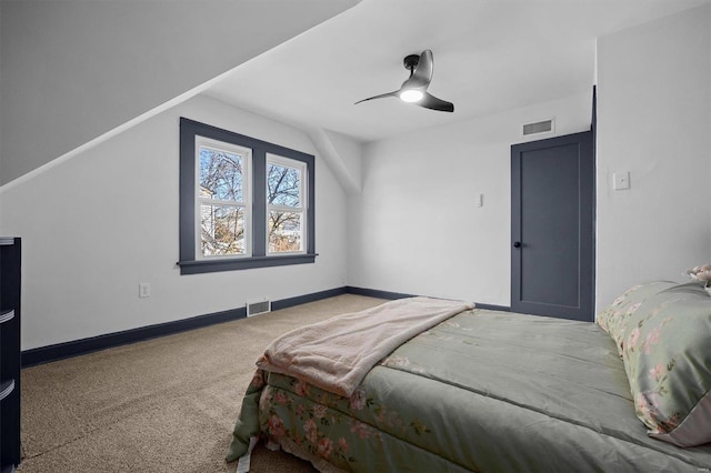 carpeted bedroom featuring ceiling fan and lofted ceiling