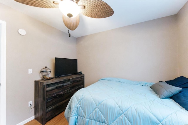 bedroom featuring ceiling fan and wood-type flooring