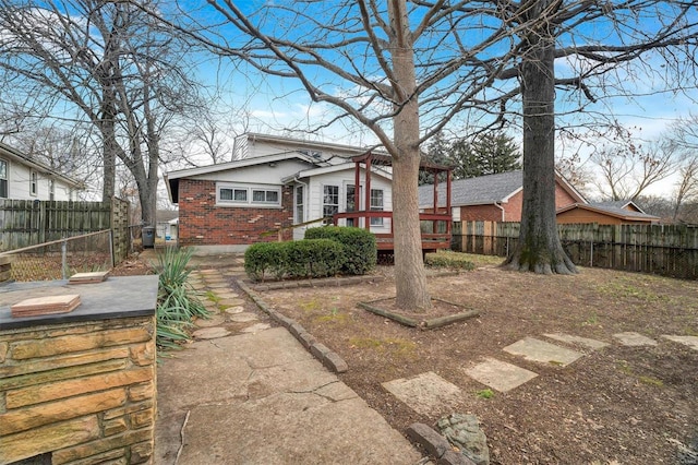 view of front of house with a deck