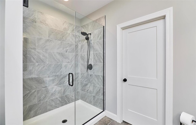 full bathroom featuring a shower stall