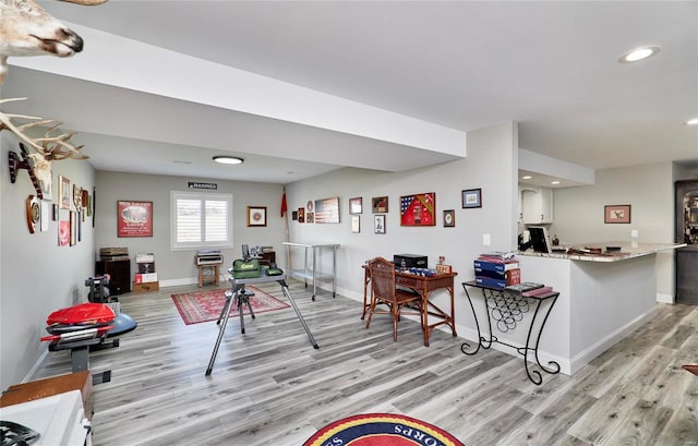 interior space with recessed lighting, light wood-style flooring, visible vents, and baseboards