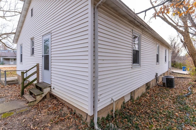 view of home's exterior with cooling unit