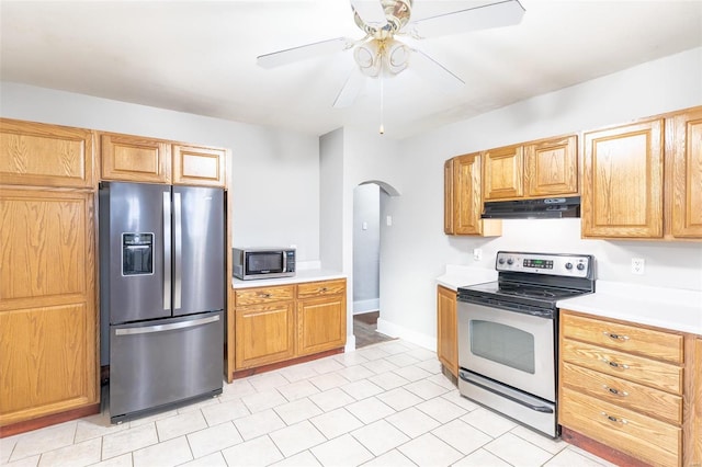 kitchen featuring stainless steel appliances and ceiling fan